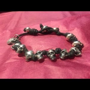 King Baby Studio Skull Bracelet on a cord.